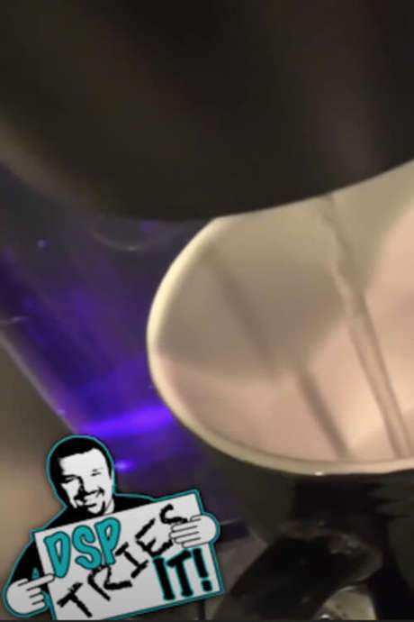 A reviewer tries to make two cups of ramen, using his Keurig to boil water. A mug blocks the pour despite nearby measuring cups. He praises the ramen’s value while complaining about its quality and hoping it cures his cold, framing the mishap as a nod to U.S. class tensions. He learns nothing, and his avoidable blunders leave viewers enduring misery.